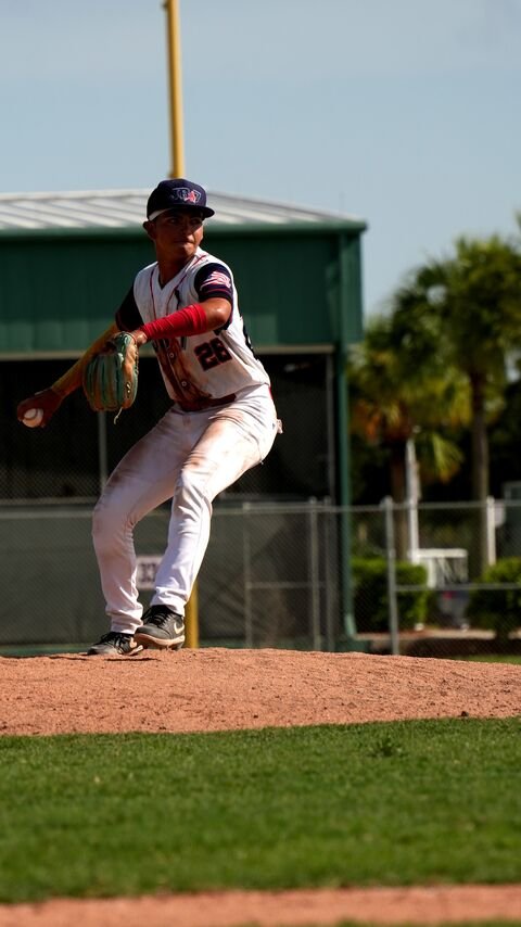 Player fielding the ball on the field