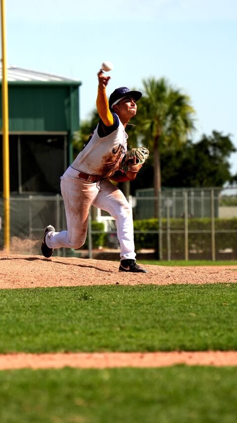 Pitcher finishing his pitch