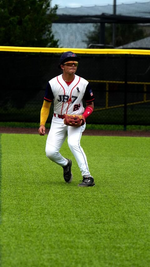 Player ready with his glove on the field