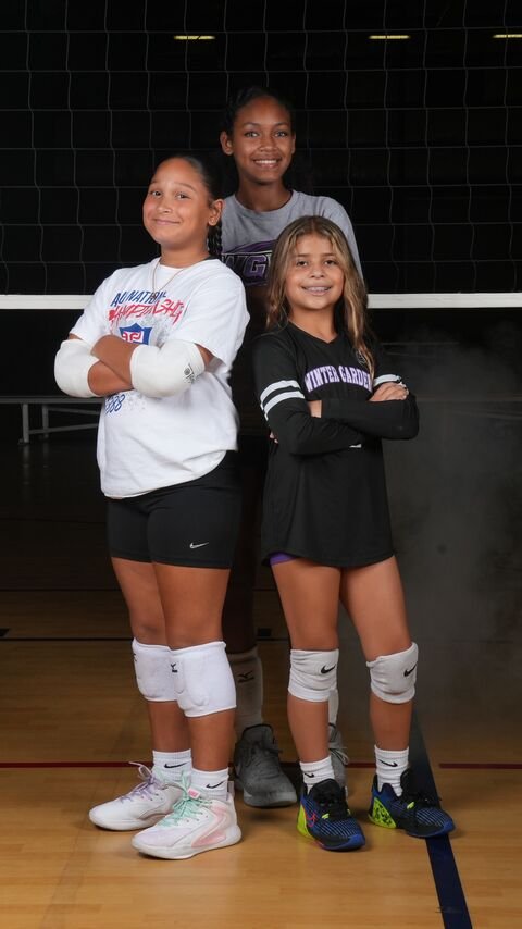 Two players posing together on the court